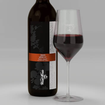 A pour of 2019 Merlot with label shown on bottle